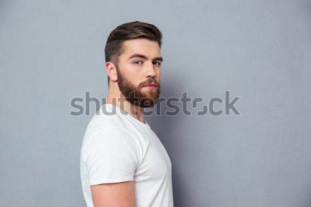Portrait of indifferent young man Stock photo © deandrobot
