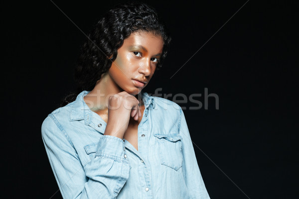Cute african young woman with fashion makeup in jeans shirt Stock photo © deandrobot