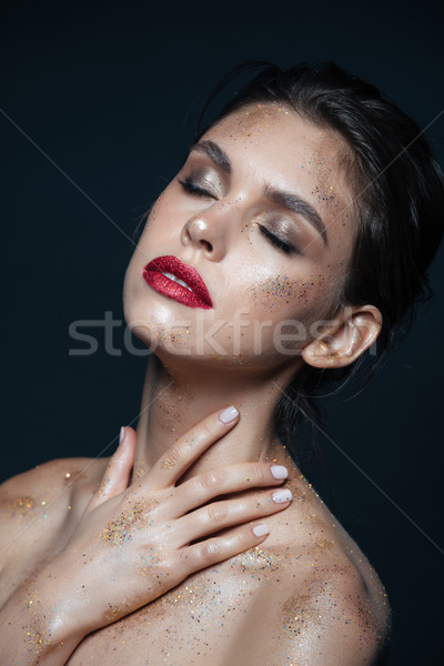 Beauty portrait of sensual young woman with shimmering makeup Stock photo © deandrobot