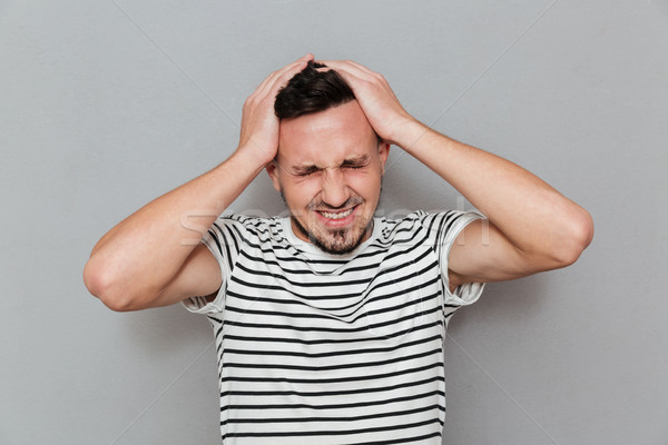 [[stock_photo]]: Portrait · jeunes · homme · souffrance · maux · de · tête