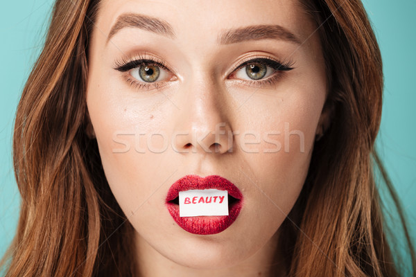 Close up portrait of a confused brown haired woman Stock photo © deandrobot