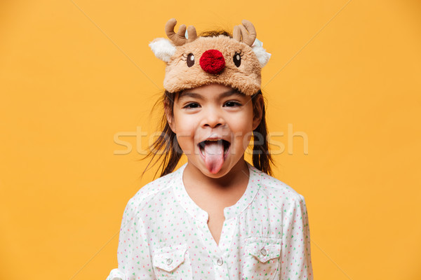 Stockfoto: Glimlachend · meisje · kind · tonen · tong · foto