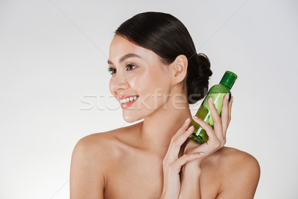 Stock photo: Beauty portrait of smiling brunette woman with soft healthy skin