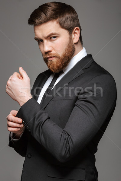 Portrait of a handsome young businessman Stock photo © deandrobot