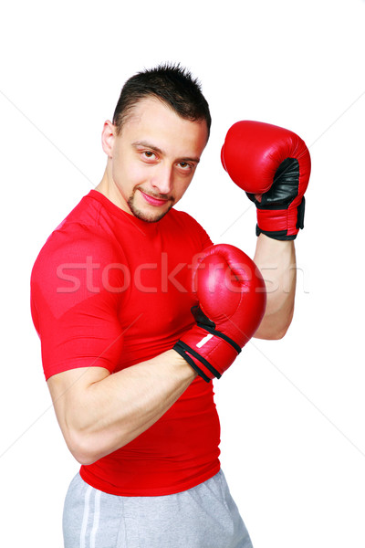 Sportsman in boxing gloves standing over white background Stock photo © deandrobot