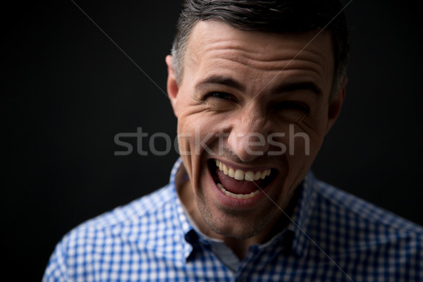 Portrait of a man screaming Stock photo © deandrobot