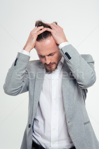 Portrait of a stressed businessman Stock photo © deandrobot