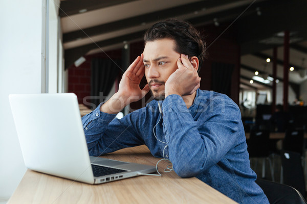 Man thinking about something in office Stock photo © deandrobot