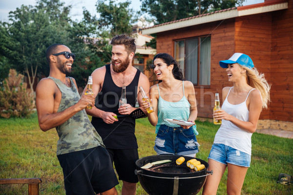 Happy teens laughing at the picnic area Stock photo © deandrobot
