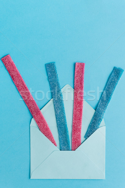 Sweet gummy sticks with blueberry and raspberry flavor Stock photo © deandrobot