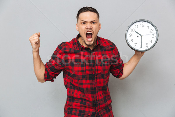 Gritando homem relógio camisas Foto stock © deandrobot