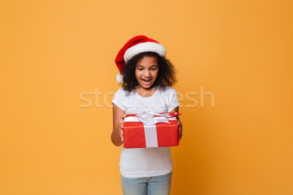 Surprised african pretty little girl Stock photo © deandrobot