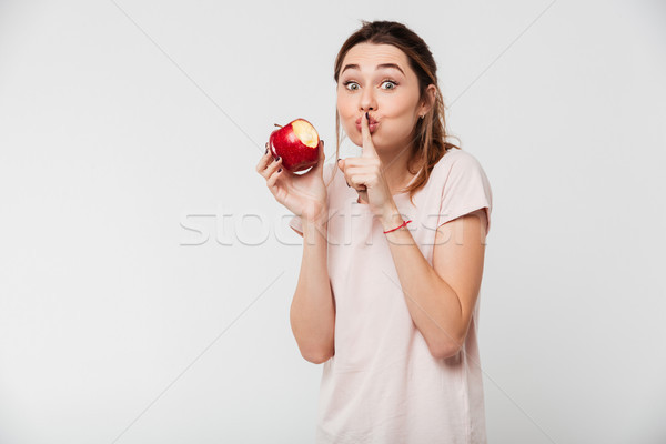 Stock photo: Close up portrait of a hungry pretty girl