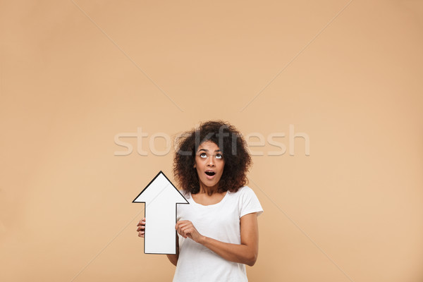 Portrait of a happy young african woman Stock photo © deandrobot