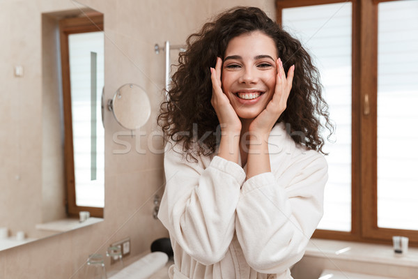 Cute femme soins peau salle de bain [[stock_photo]] © deandrobot