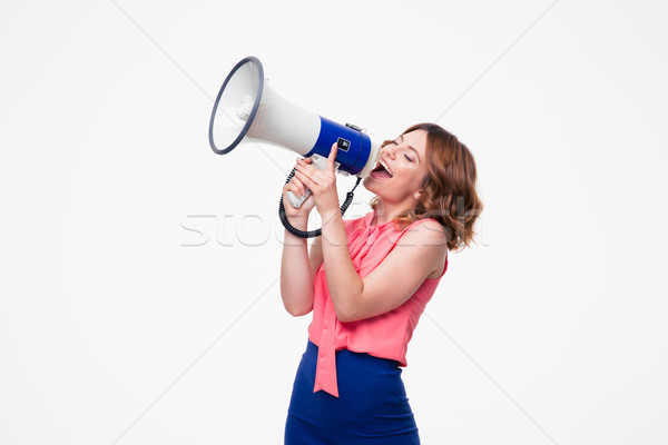 Happy woman shouting in megaphone Stock photo © deandrobot