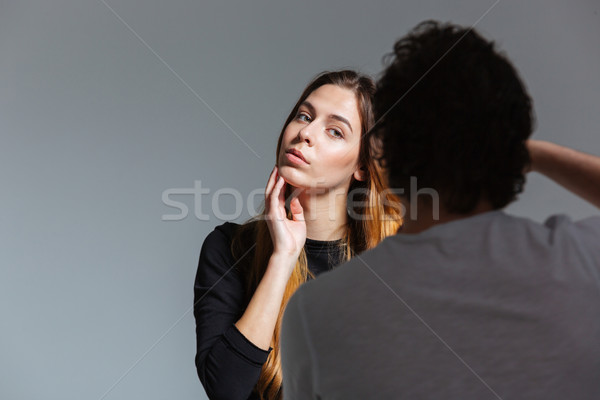 Man photographing female model Stock photo © deandrobot