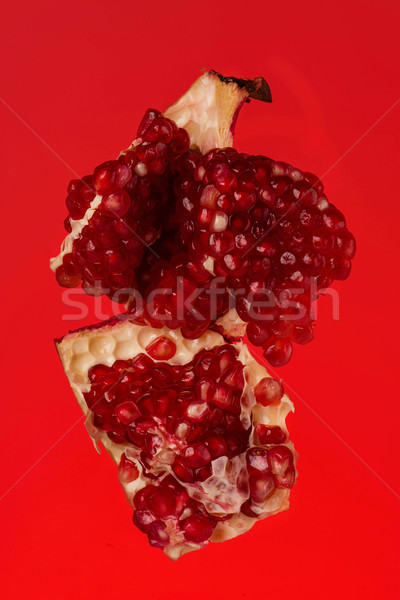 Defekt Granatapfel Segment isoliert rot Natur Stock foto © deandrobot