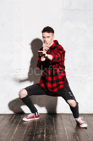 Vertical image of Hipser prepares for battle Stock photo © deandrobot