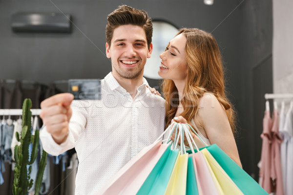 Satisfacut cumpărături haine împreună îmbrăcăminte Imagine de stoc © deandrobot