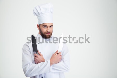 Happy male chef cook sharpening knife Stock photo © deandrobot