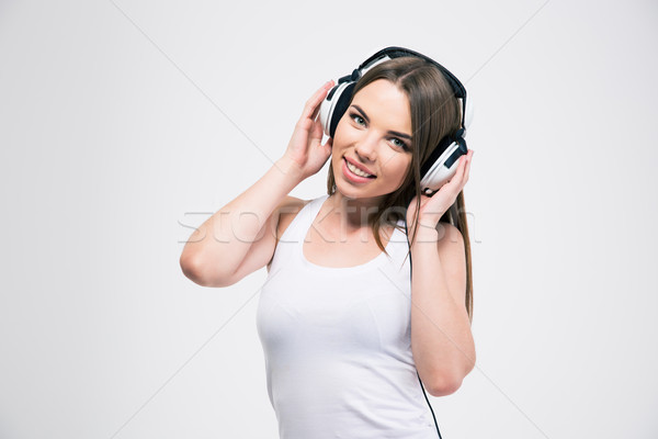 Stockfoto: Glimlachend · cute · meisje · luisteren · muziek · hoofdtelefoon
