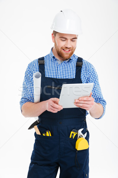 Stockfoto: Gelukkig · knap · jonge · bouwer · helm · permanente