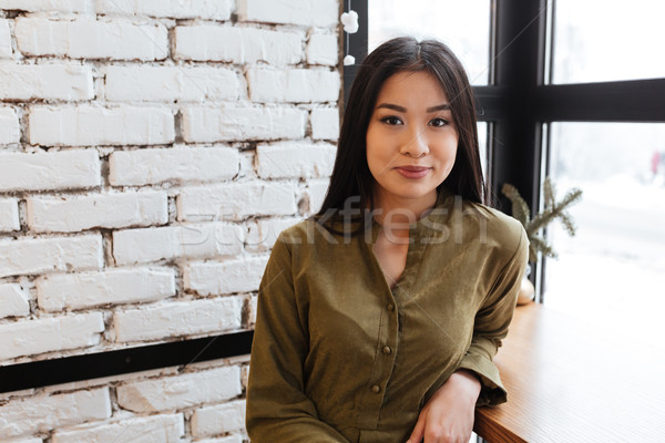 Stock photo: Beautiful asian young lady standing at the cafe