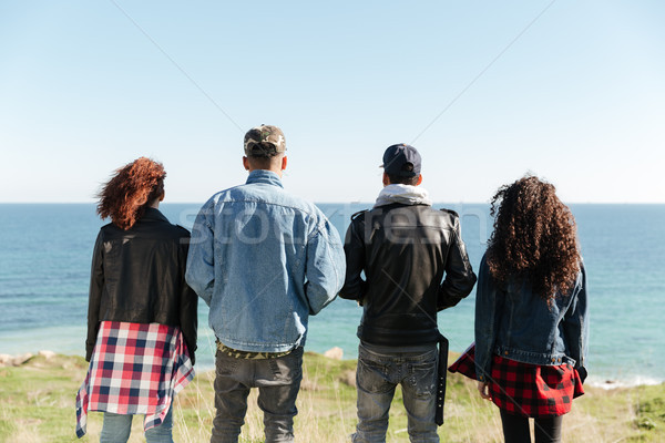 Hátulnézet kép csoport barátok áll kint Stock fotó © deandrobot