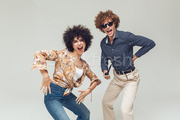 Emotional happy retro loving couple Stock photo © deandrobot