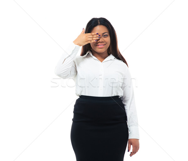 African businesswoman covering one eye with hand Stock photo © deandrobot