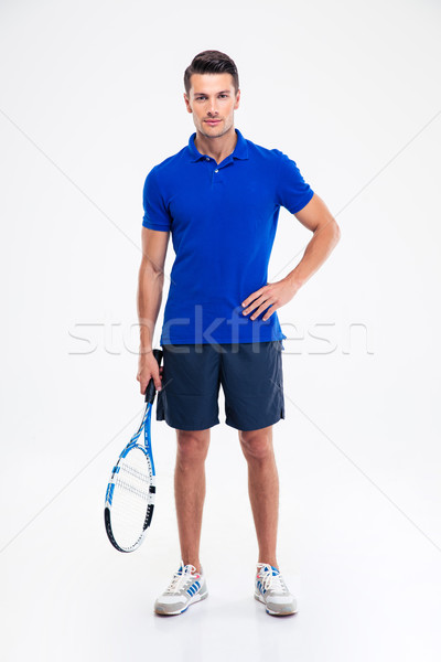 élégant sport homme permanent raquette de tennis [[stock_photo]] © deandrobot