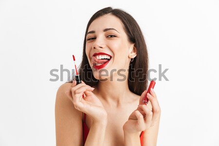 Thoughtful attractive curly woman with bright makeup in retro style Stock photo © deandrobot