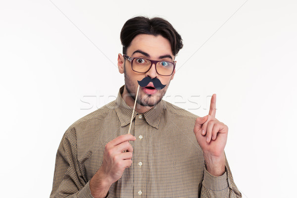 Hombre palo bigote senalando dedo Foto stock © deandrobot