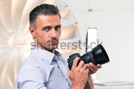 Porträt gut aussehend junger Mann halten gun Business Stock foto © deandrobot