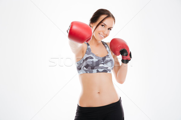 Mulher luvas de boxe estúdio isolado branco mulheres Foto stock © deandrobot
