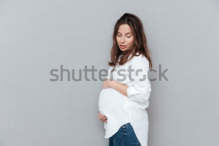 Mujer embarazada perfil aislado gris moda embarazadas Foto stock © deandrobot