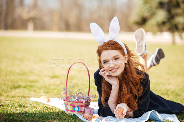 Portrait of a smiling happy red head girl Stock photo © deandrobot