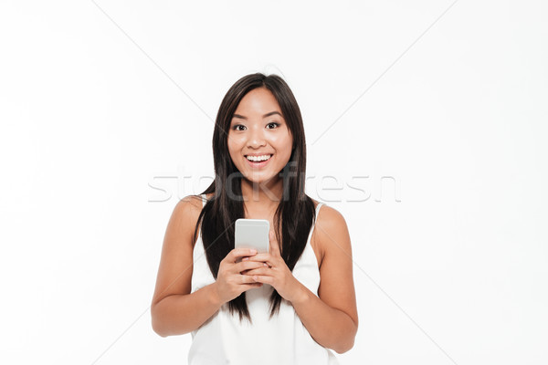 Portrait souriant satisfait asian femme [[stock_photo]] © deandrobot