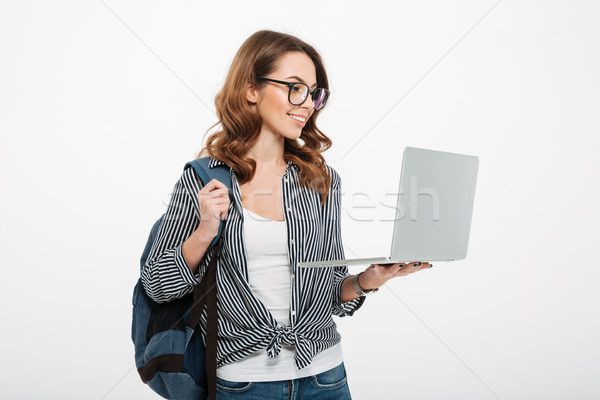 Ziemlich jungen Dame Studenten mit Laptop Computer Stock foto © deandrobot