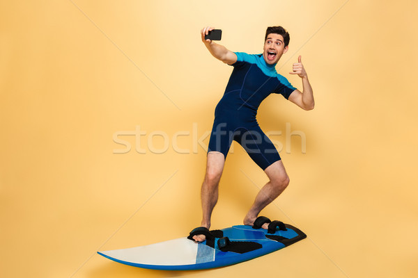 Stock foto: Porträt · junger · Mann · Badeanzug · Aufnahme · Surfen