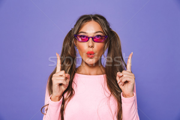 Stock photo: Portrait of a pretty girl in sweatshirt in sunglasses