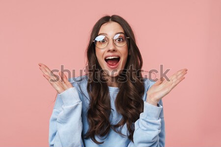 Cute woman with facial expression of surprise Stock photo © deandrobot