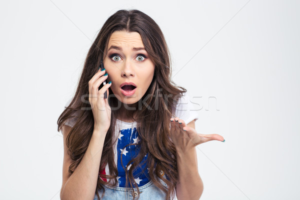 Porträt erstaunt Frau sprechen Telefon isoliert Stock foto © deandrobot
