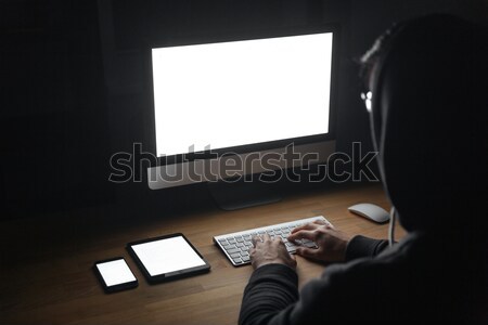 хакер экране компьютер таблетка сотового телефона вид сзади Сток-фото © deandrobot