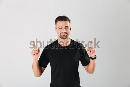 Portret młody człowiek środkowy palec Zdjęcia stock © deandrobot