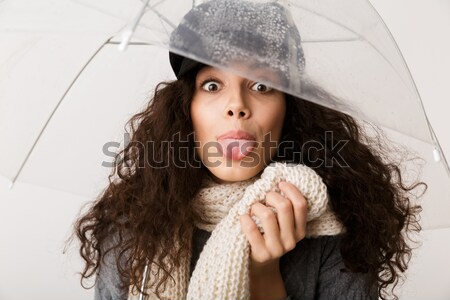 Calm Hipster woman in black hat Stock photo © deandrobot