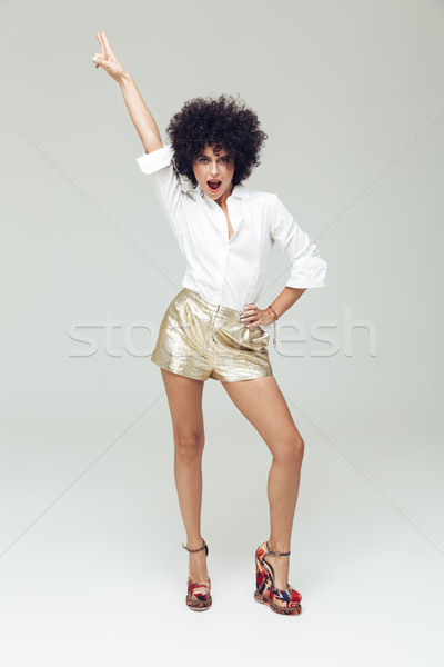 Amazing retro woman dressed in shirt Stock photo © deandrobot