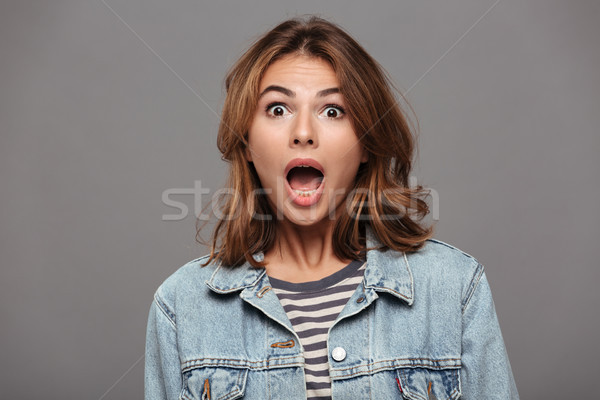 Close up portrait of a shocked scared teenage girl Stock photo © deandrobot