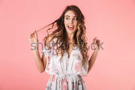 Close-up portrait of young smiling woman dressed as princess poi Stock photo © deandrobot